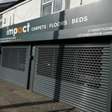 Company/TP logo - "Impact Carpets & Floors"