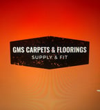 Company/TP logo - "GMS CARPETS & FLOORINGS LTD"