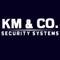 Company/TP logo - "KM&CO. Security Systems"