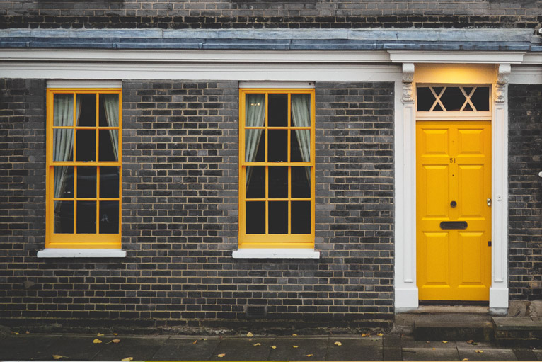 Colourful House Interior Design: Bold yellow door & windows