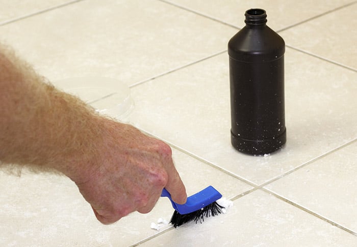 How to clean grout between tiles