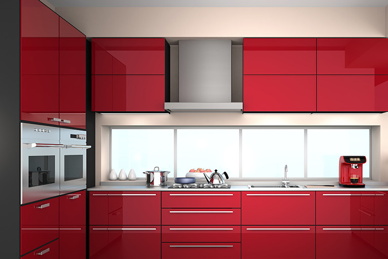 Kitchen design trend - modern kitchen with sleek red cabinets