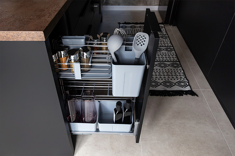 Kitchen design trend - concealed pull-out storage cabinet 