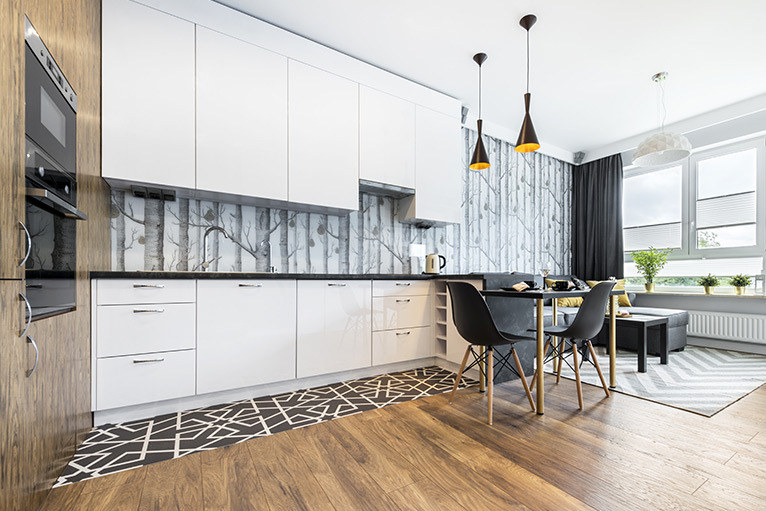 Kitchen design trend - open plan kitchen with black and white patterned tiles