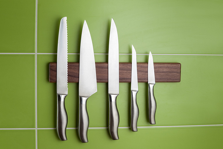 Magnetic knife rack on wall
