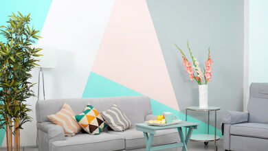 Bright blue, pink and grey geometric print feature wall