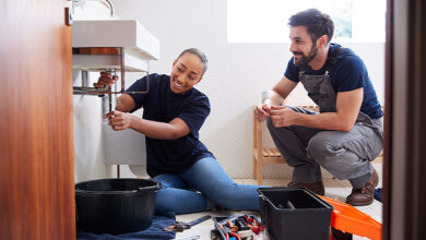 female plumbing apprentice