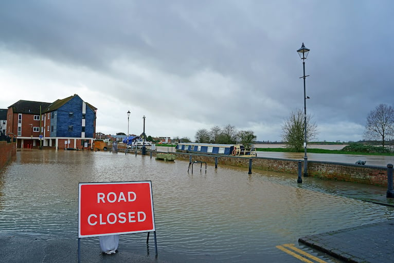Storm damage: Flooded road in Tewkesbury, Gloucestershire following Storms Dennis and Ciara