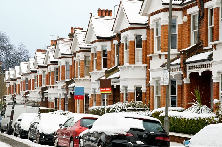 Snow-covered terrace of houses