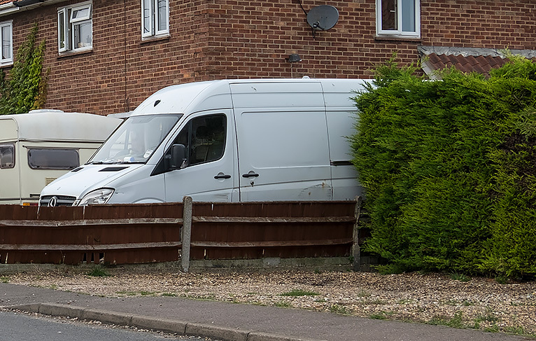 White van parked in driveway