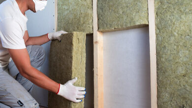 Soundproofing specialist installing soundproofing insulation