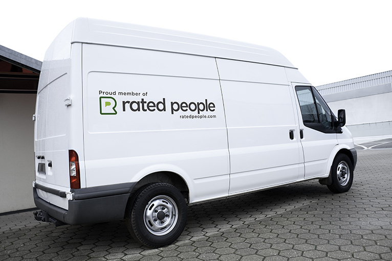 White van with Rated People sticker