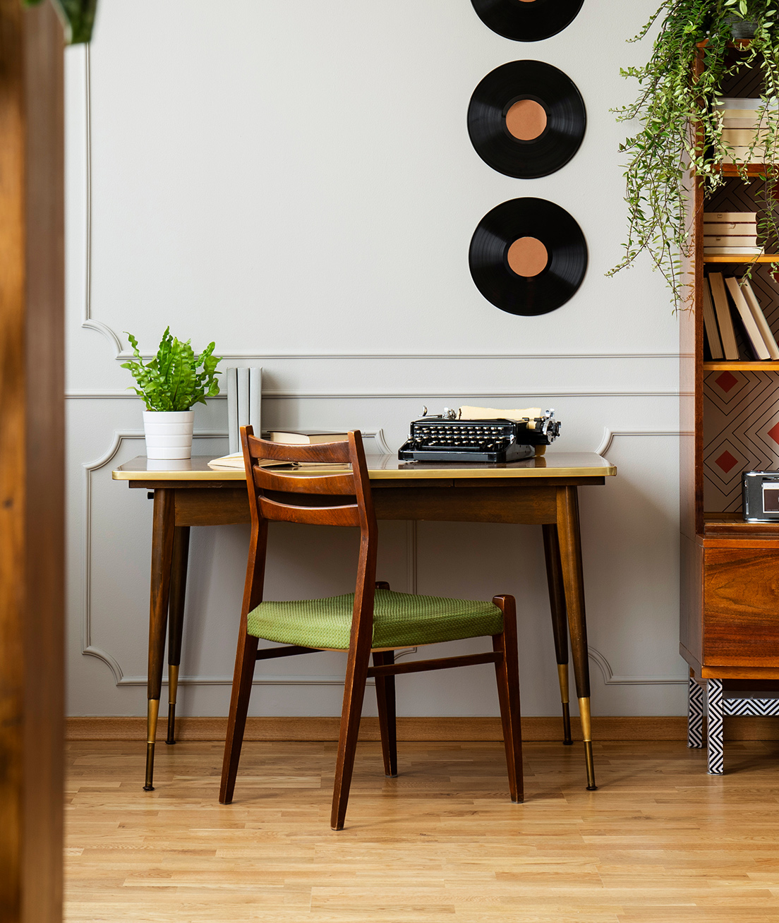 Wooden writing desk with typewriter.