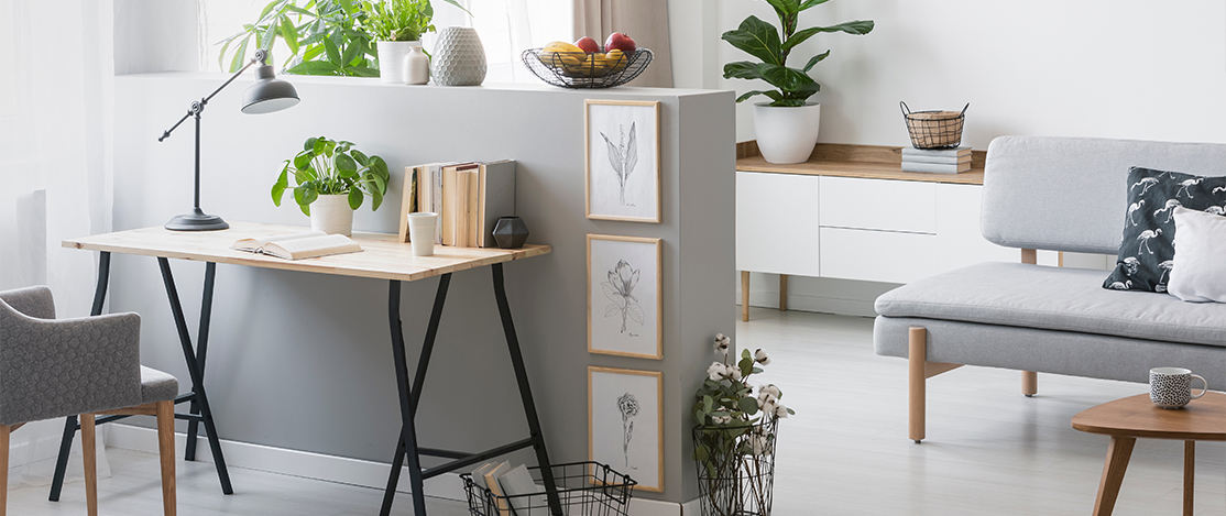 Stylish interior with grey walls and work area.