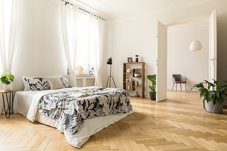 Large bedroom with herringbone floor