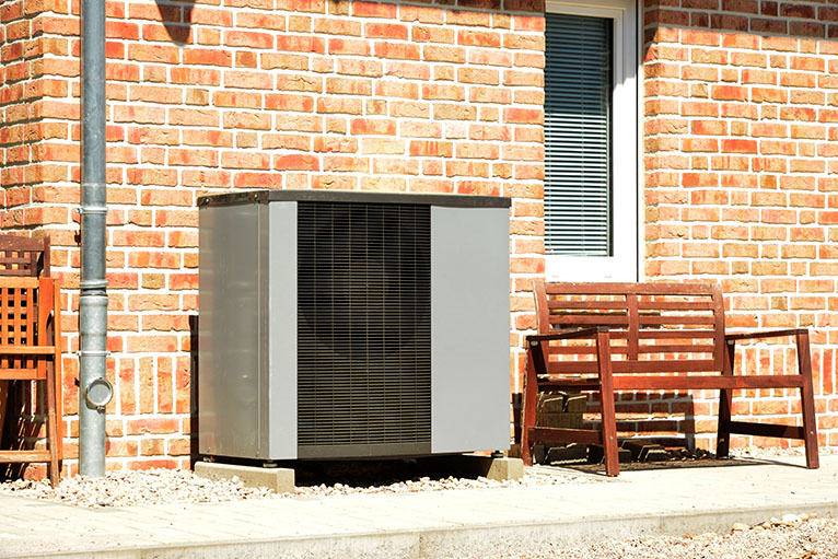 Air source heat pump outside home