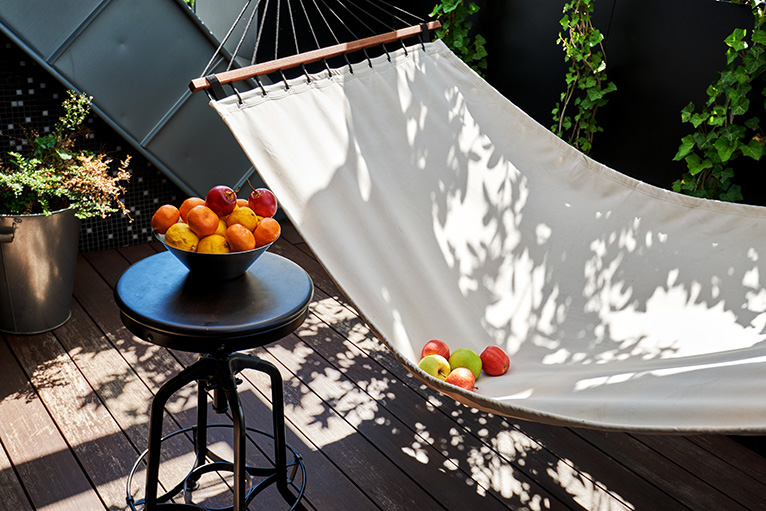 Small patio with hammock