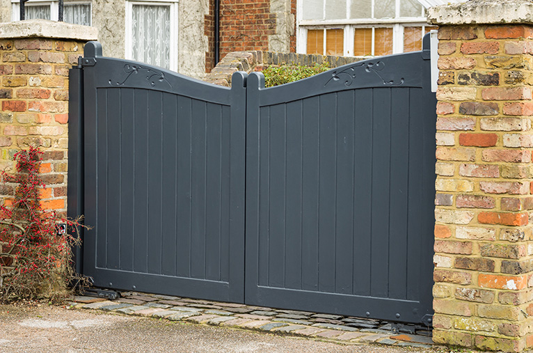 Wooden, dark grey driveway gate
