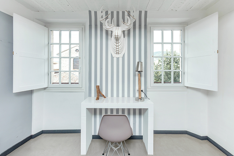 White and grey striped feature wall in home office