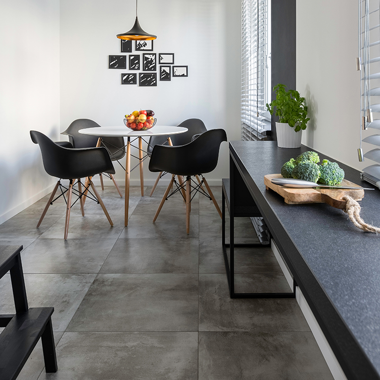 Small kitchen with concrete floor tiles