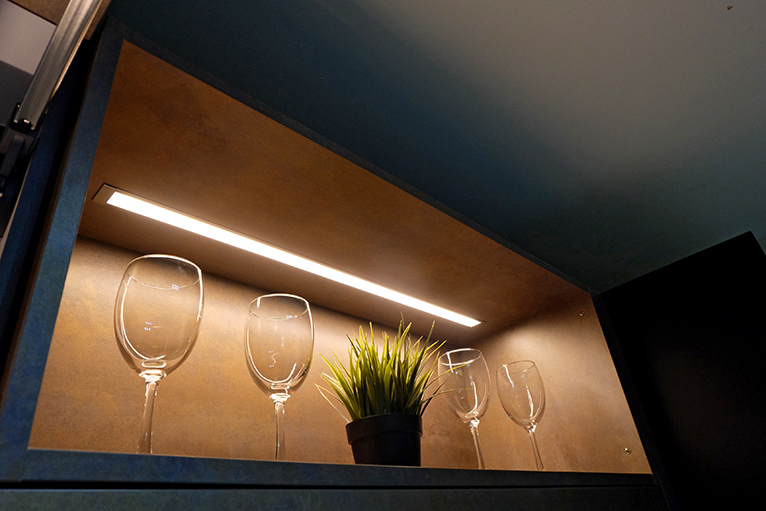 LED lighting built into open kitchen shelf