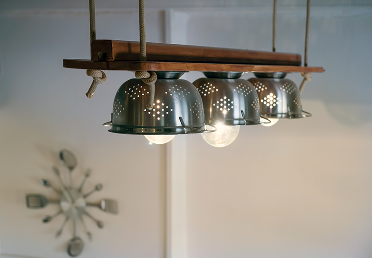 Kitchen makeover hacks: Kitchen lighting feature made from colanders
