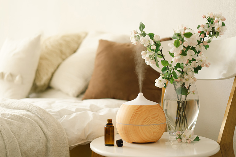 Wellbeing home design: Aroma oil diffuser on bedside table