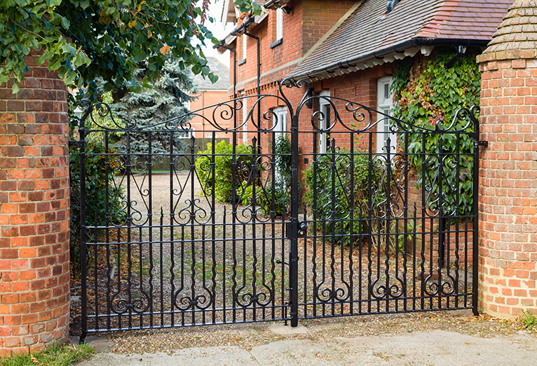 Gated driveway with metal gates