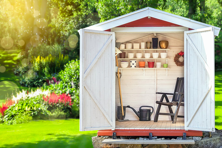 Organised garden shed with chair