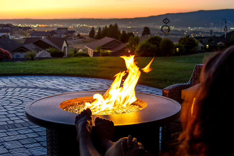 Love Island garden inspiration: Roaring firepit overlooking the sunset 