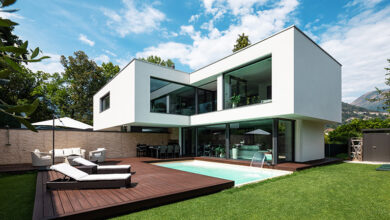 Modern white villa with swimming pool and patio