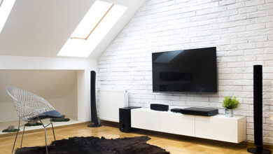 TV mounted on exposed brick wall