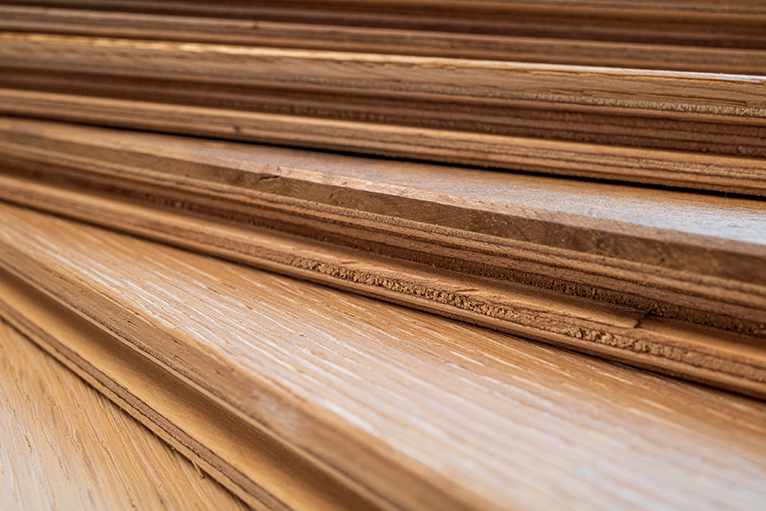 Engineered wooden boards with different layers