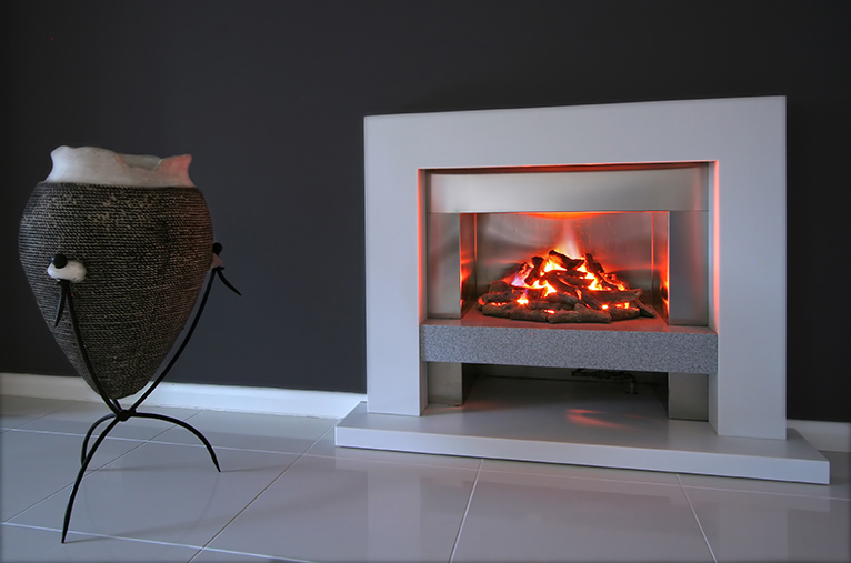 Modern nordic designed electric fire place with bright orange flames switched on.