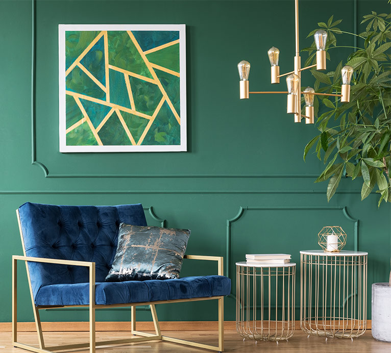 Picture of a living room with green walls and blue chair