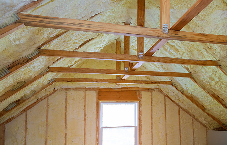 Polyurea roof insulation in attic