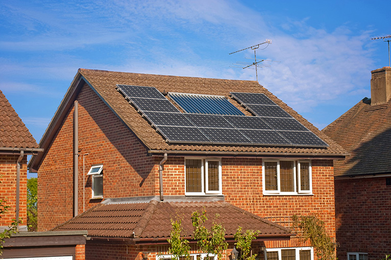 Picture of a UK home with solar panels on the roof