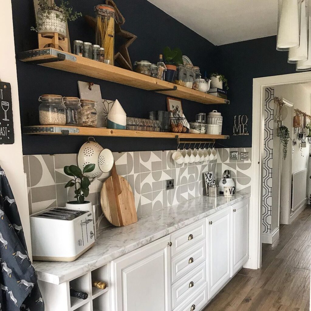 kitchen with hand painted tiles with geometric grey pattern on them