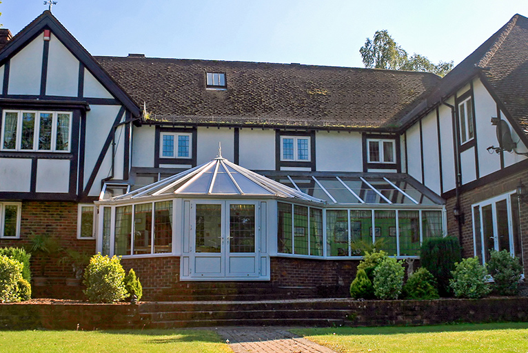 Tudor style house with large conservatory