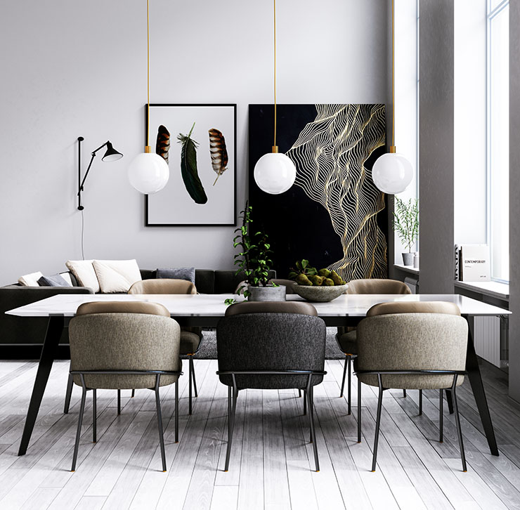 Modern living room with black and gold décor, large dining table and grey wooden flooring.