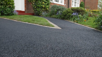 Picture of a house with a tarmac driveway