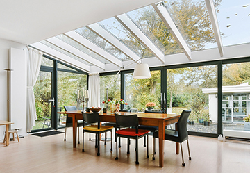 Picture of a dining room in a glass rear extension