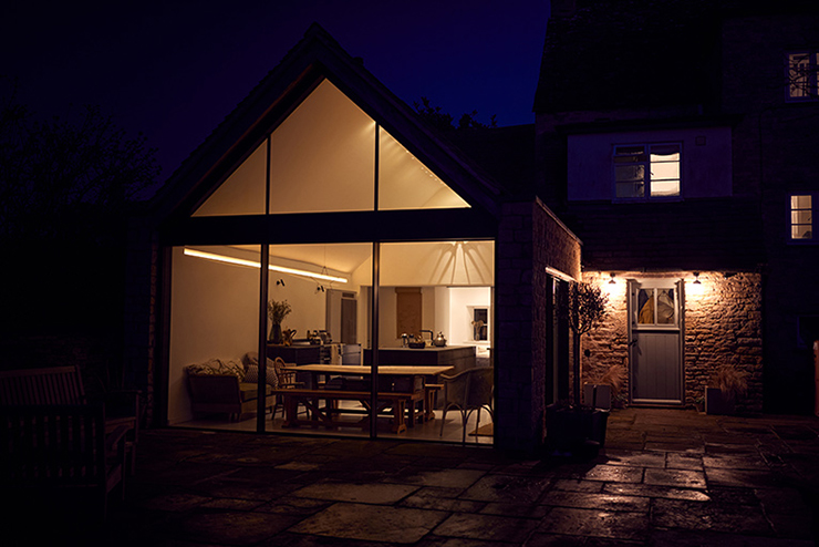 Picture of a wrap around home extension at night
