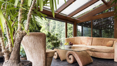 Picture of a conservatory with stylish chairs and coffee table