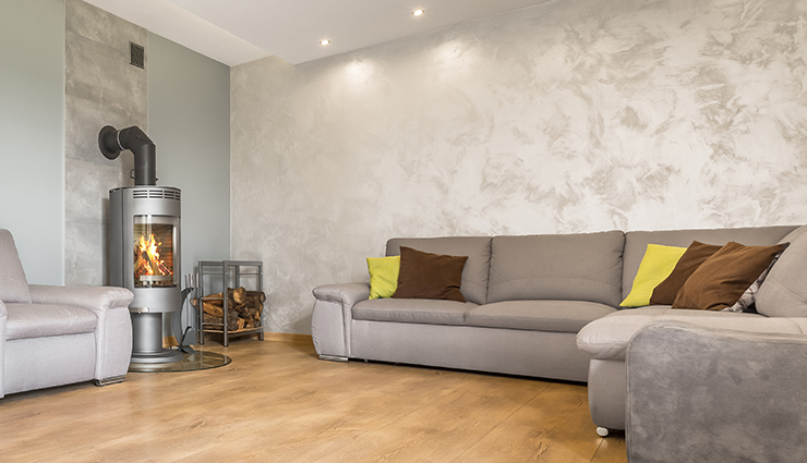 Living room with venetian plaster walls and wooden floors