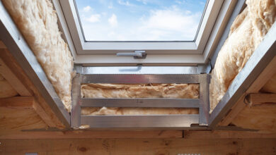 Picture of a loft with roof window being insulated