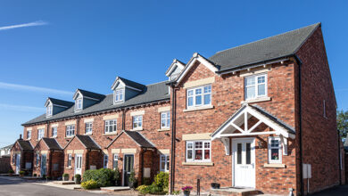 Picture of the exterior of a row of new terraced homes