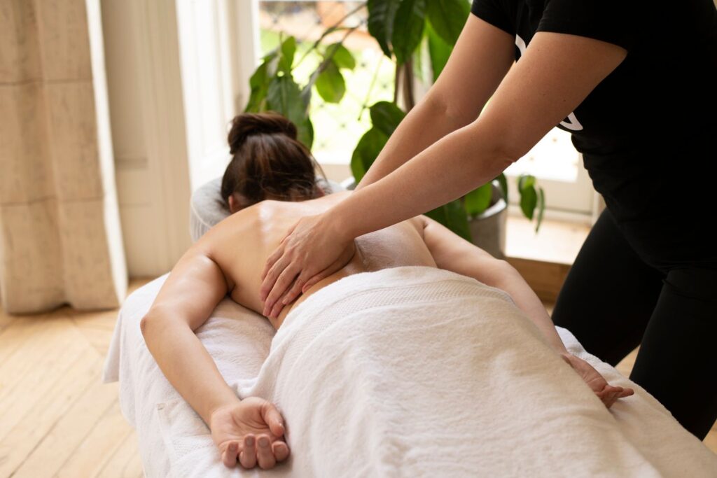 Picture of a woman getting a massage done at home