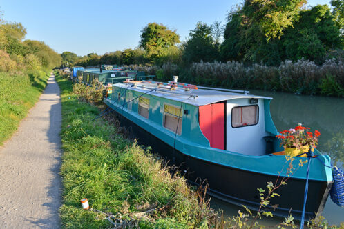 Picture at an angle of a moored narrowboat 