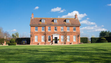 Picture of a period property with green grass